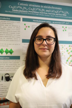 Natalia in front of her award-winning poster at ECSSC-17 in Lille.